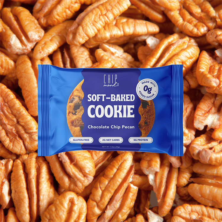 Blue package of soft-baked cookie with pecans in the background